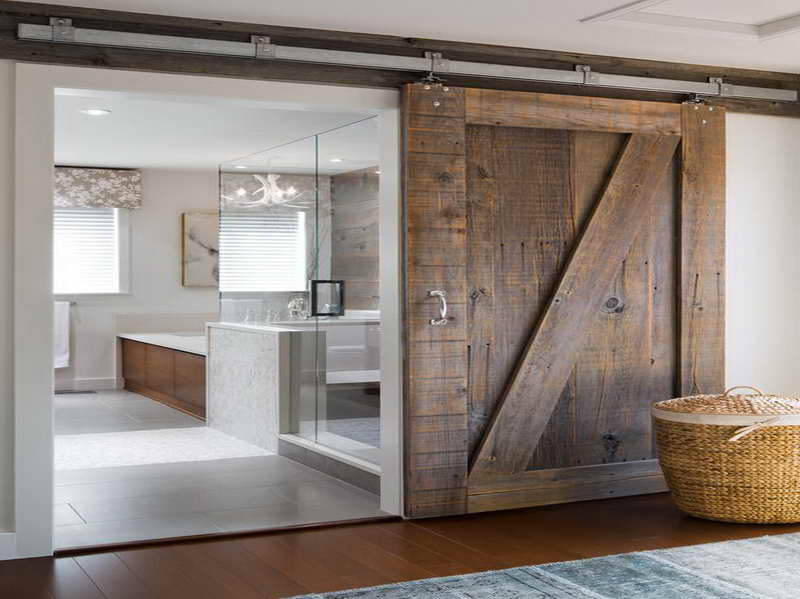 photo credit: http://homesinteriordesign.net/wp-content/uploads/2013/09/Residential-Interior-Barn-Doors-with-hardwood-material.jpg