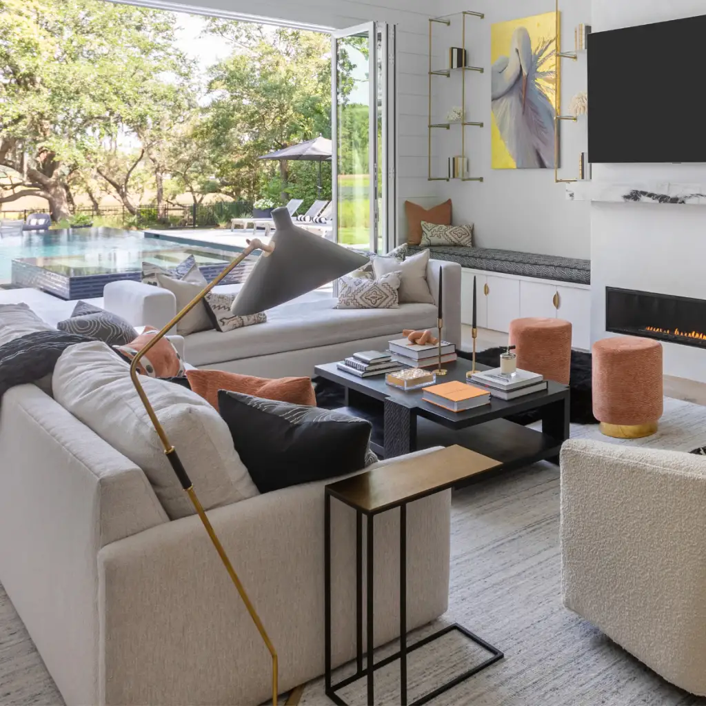 A closer look at the repeating forms in this contemporary coastal living room, featuring a floor lamp with a sleek profile and angled lines