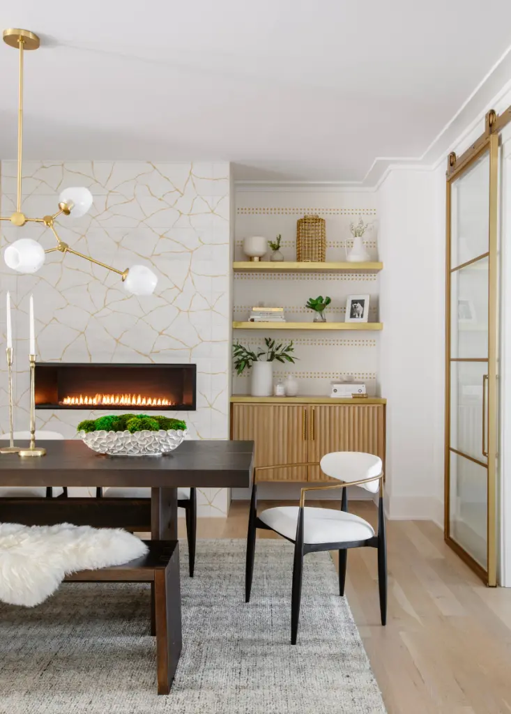 A dining room displaying a blend of contemporary interior design and coastal interior design, with sleek furniture, soft textures, and a minimalistic color palette.